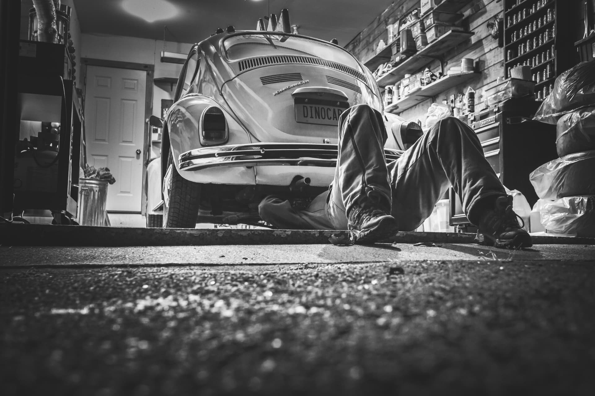 Automotive technician working on a car, illustrating the automotive website concept